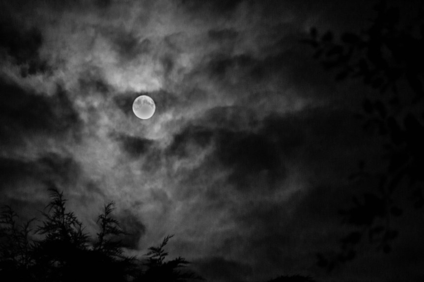 dramatic cloudy sky with full moon