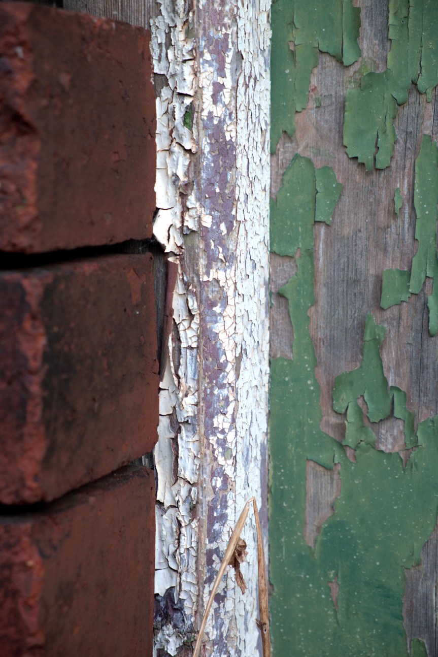 Green and White flaking paint