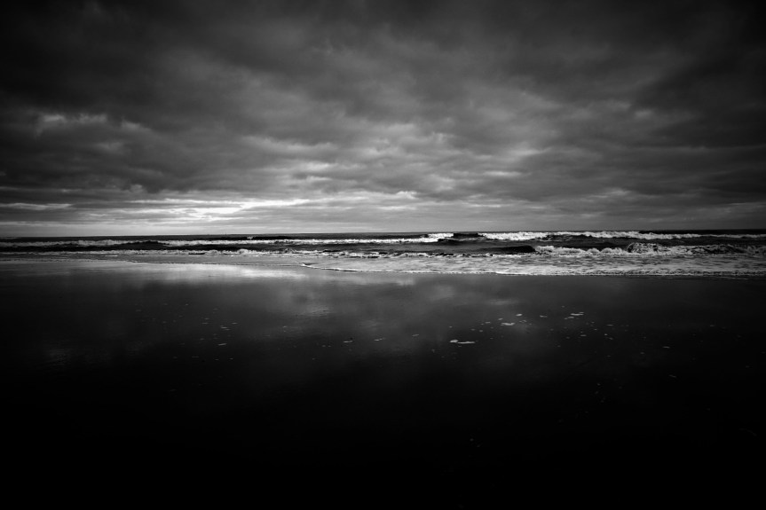 Waves roll accross the beacjh at Scarborough