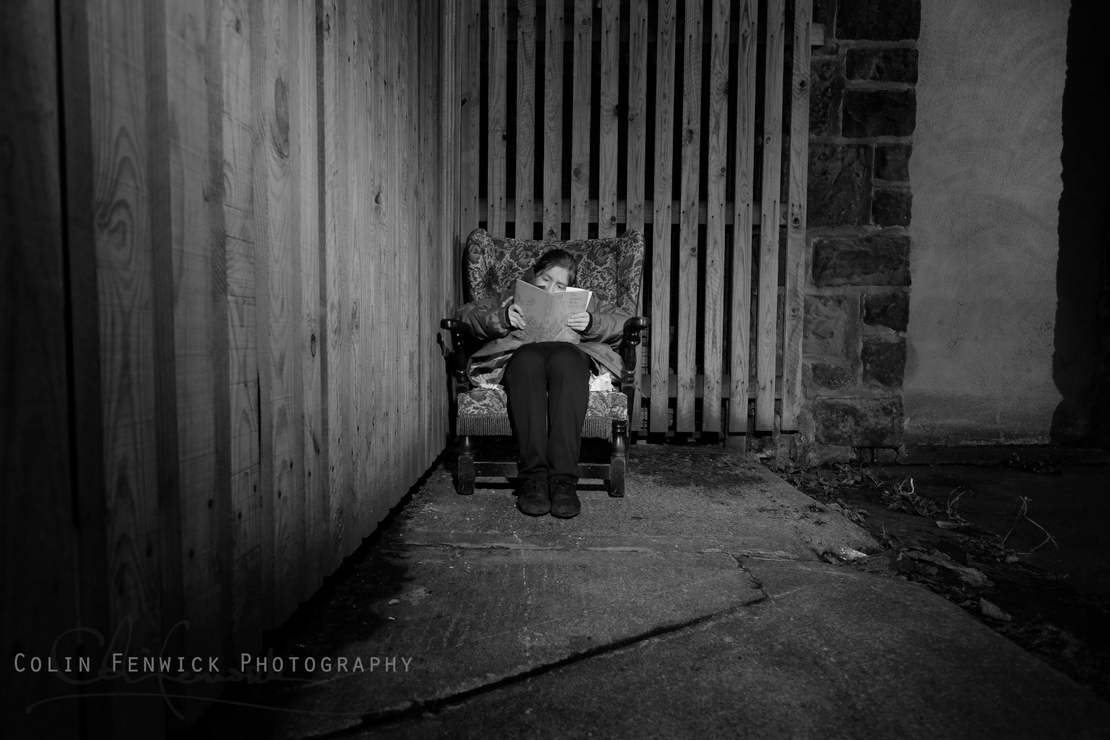Girl sat reading a book