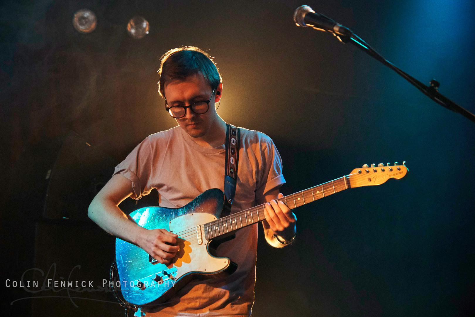 guitaris playing a telecaster