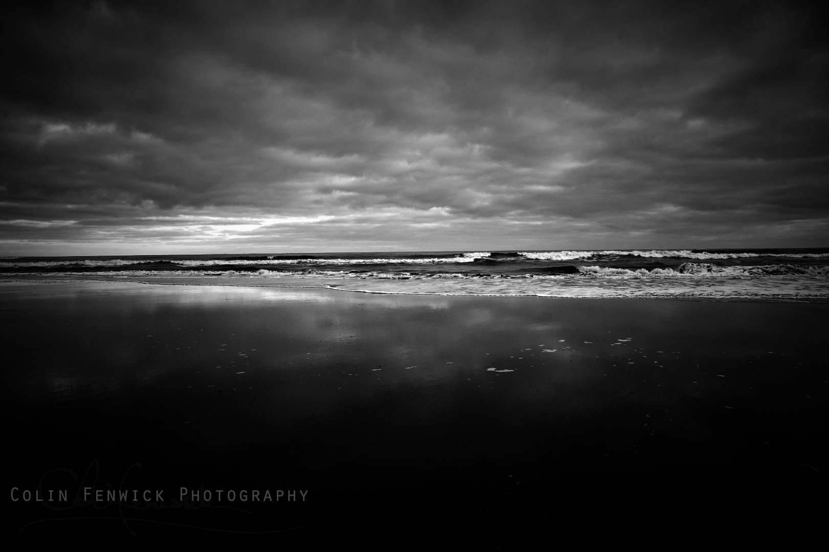 Moody beach scene in black and white