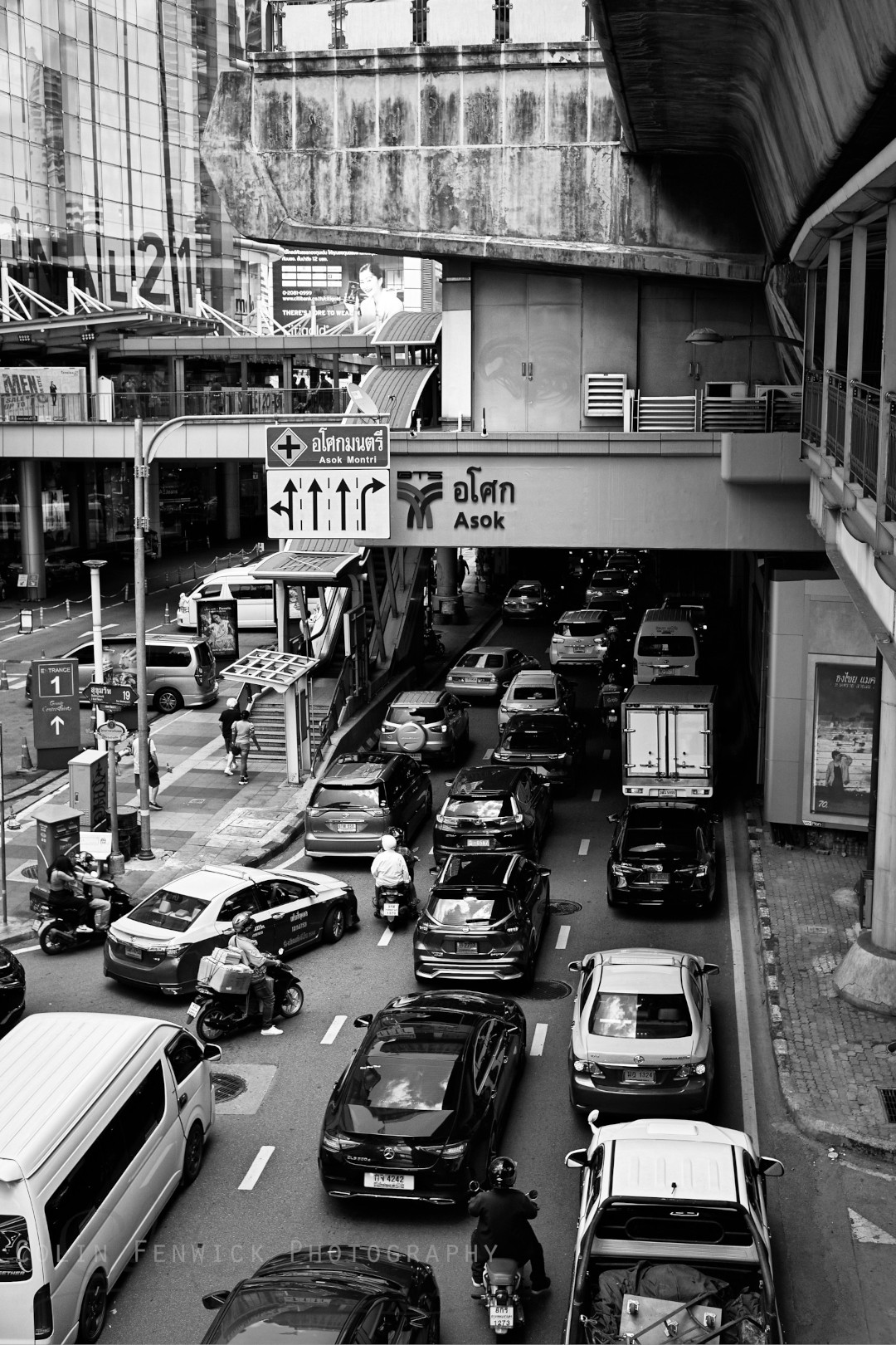 View of Asok BTS station with traffic underneath