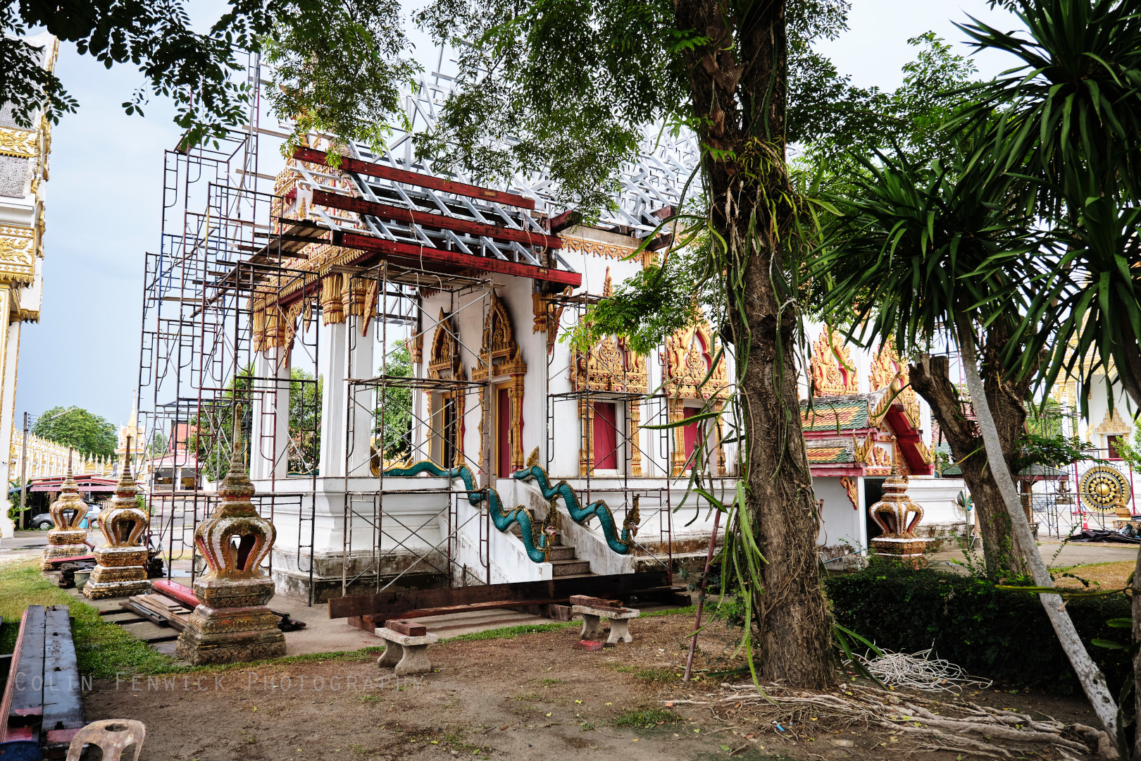 A small temple building having a roof repaired