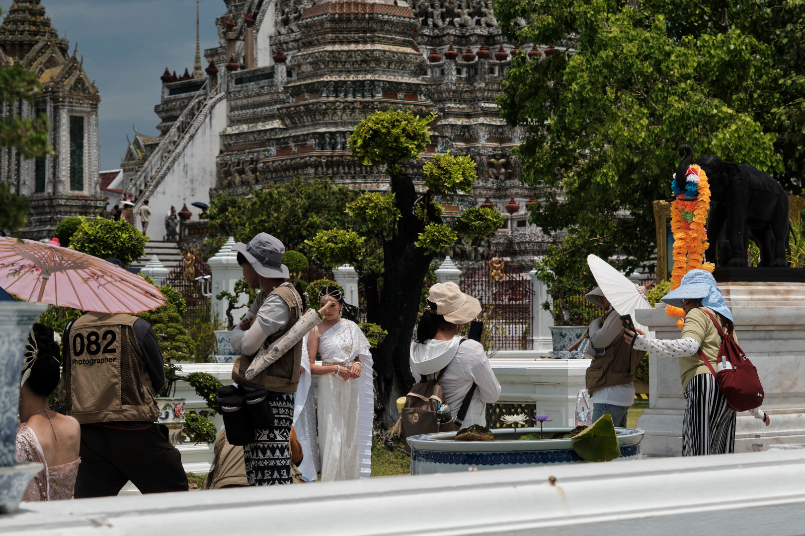 people taking photos at Wat Arun