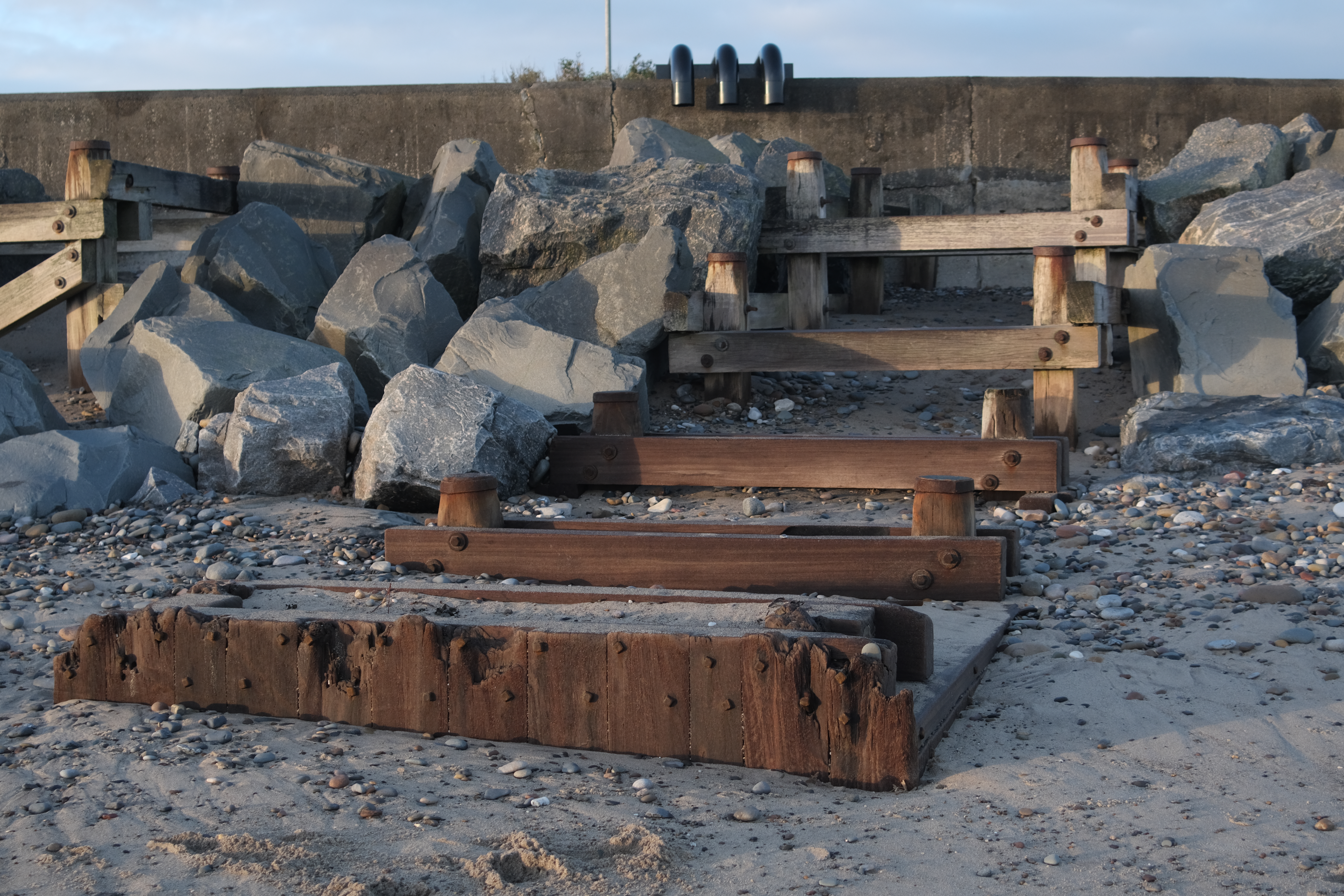 Old wooden steps on a beach
