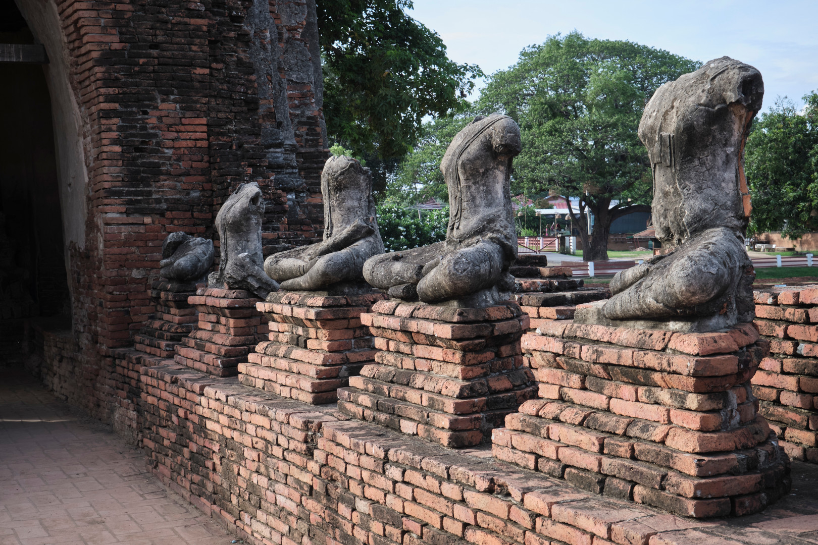 Damaged Buddha statues